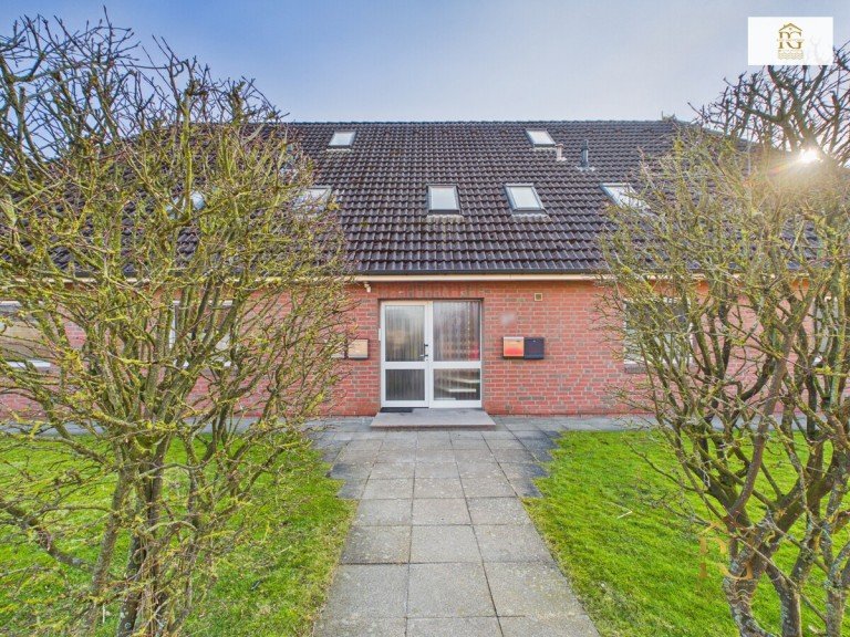 Hausansicht Neuenkirchen Etagenwohnung Gepflegte Eigentumswohnung n�he Nordseebad Otterndorf mit Terrasse und Gartenhaus in einem gepflegtem Mehrfamilienhaus in Neuenkirchen