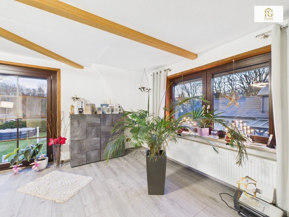 Wohnzimmer OG Mehrfamilienhaus Schiffdorf / Bramel