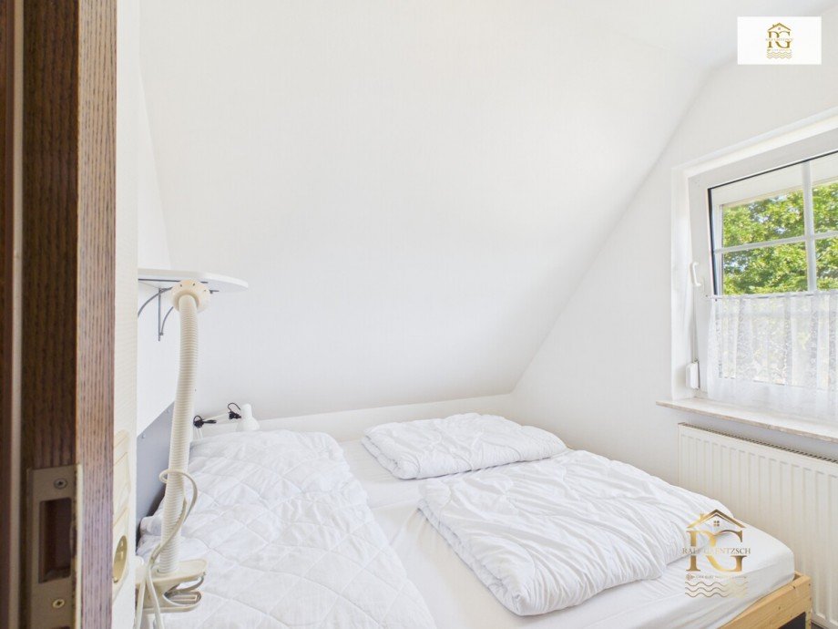 1.Schlafzimmer Haus A Ferienhaus Otterndorf