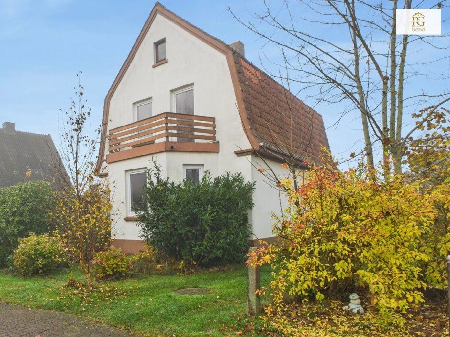 Hausansicht seitlich von vorne Einfamilienhaus Neuhaus an der Oste