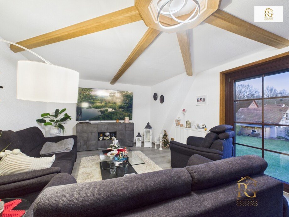 Wohnzimmer OG Mehrfamilienhaus Schiffdorf / Bramel