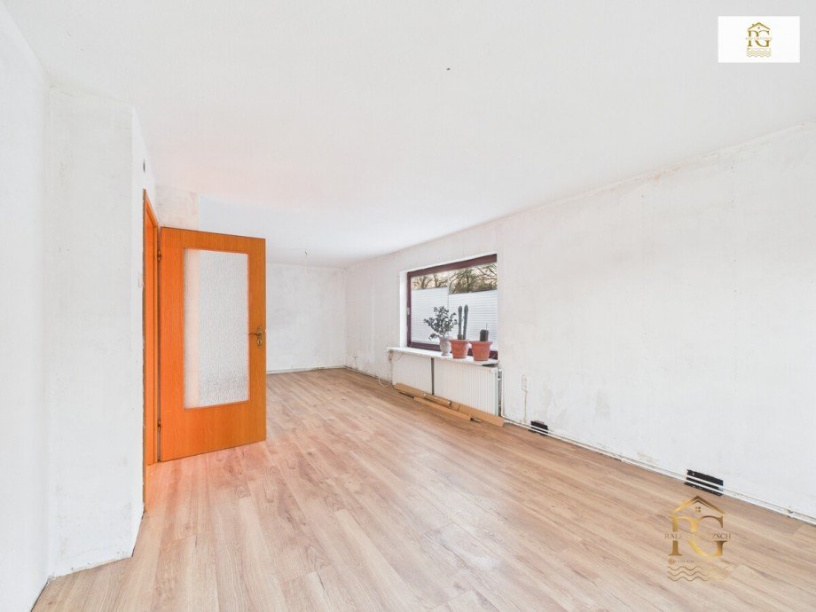 Wohn-Esszimmer EG Mehrfamilienhaus Schiffdorf / Bramel